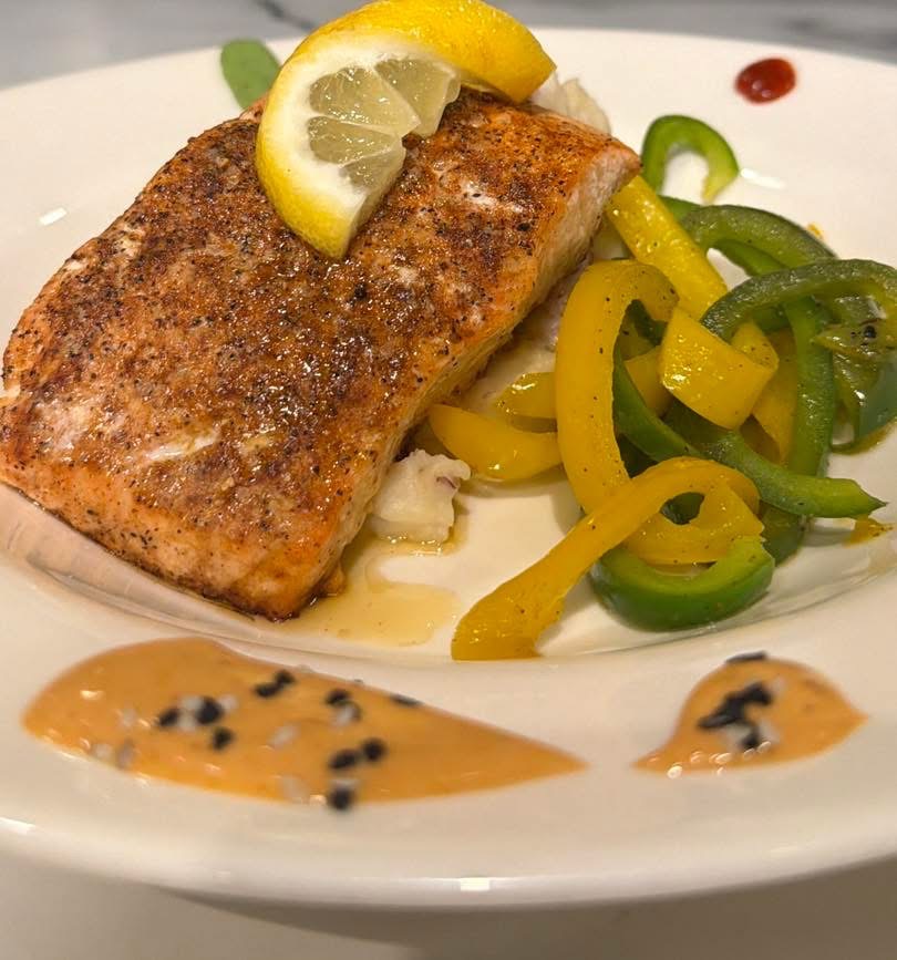 Salmon entree with peppers